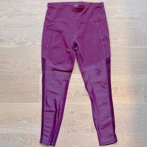 Sweaty Betty maroon mesh detailed leggings.